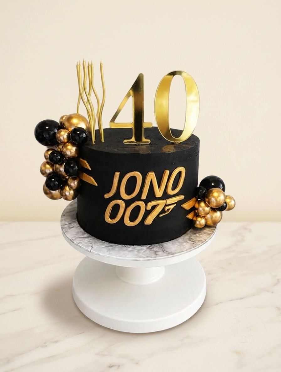 Black and gold JONO 007 themed 40th birthday cake with gold balloons