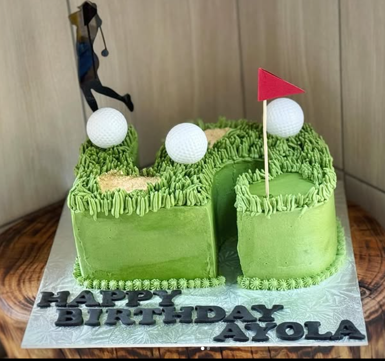 Number birthday golf course cake with grass piping and red flag