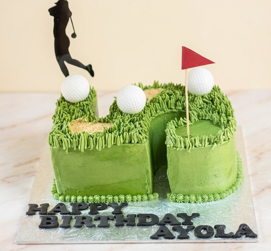 Number birthday golf course cake with grass piping and red flag