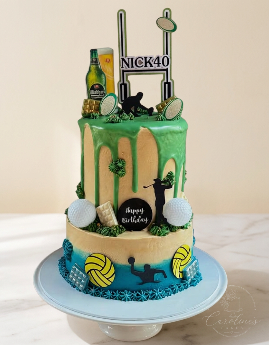 Two-tier NICK40 sports themed cake with rugby, golf and water polo