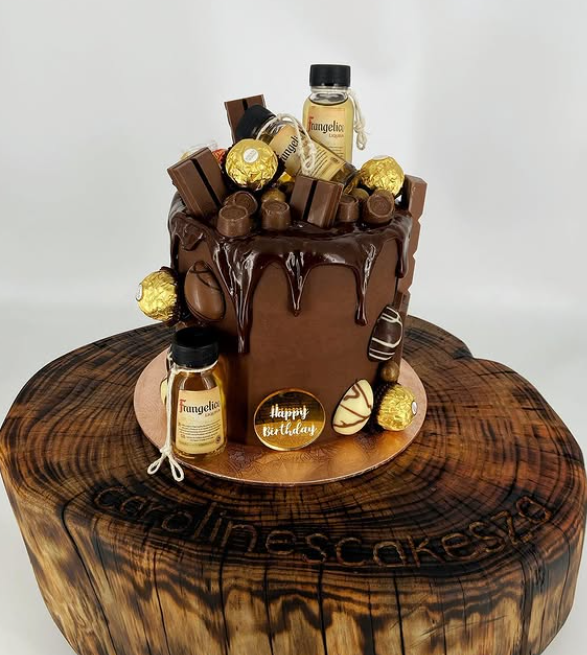 Chocolate Frangelico drip cake loaded with chocolates