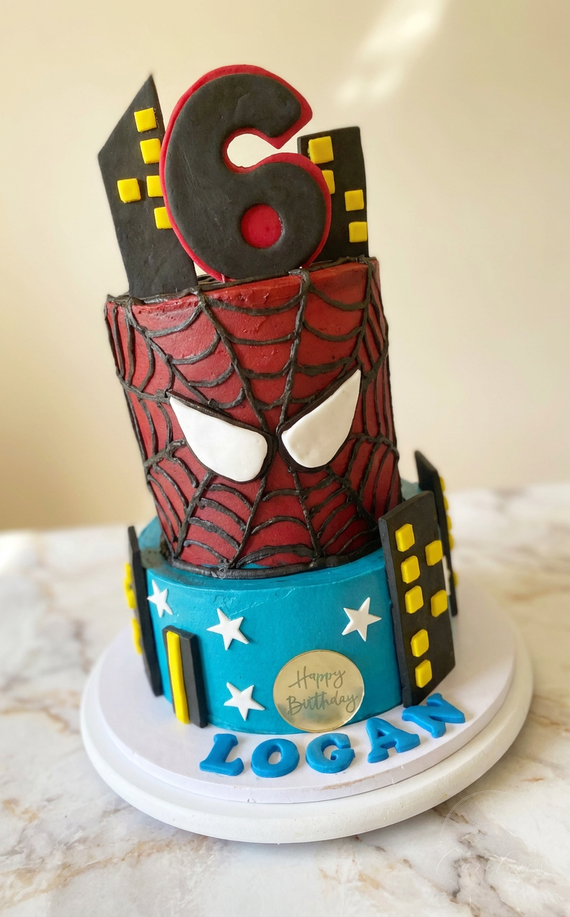 Spider-Man two-tier 6th birthday cake with city skyline